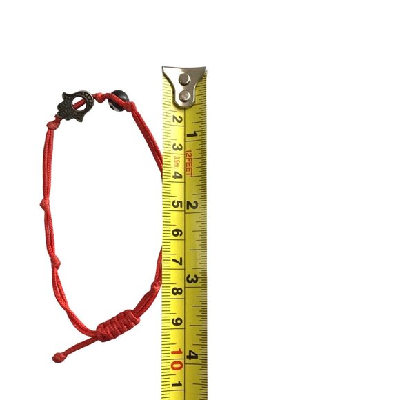 RED ADJUSTABLE BRACELET WITH EVIL EYE AND HAND CHARM - Picture 3 of 3
